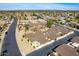 An aerial view of a Sun City West neighborhood featuring lush landscaping and well-maintained streets at 13404 W Copperstone Dr, Sun City West, AZ 85375