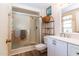 Updated bathroom featuring a shower, updated vanity and modern fixtures at 13404 W Copperstone Dr, Sun City West, AZ 85375