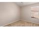 Bright bedroom with carpet flooring and a window at 15431 S 36Th Pl, Phoenix, AZ 85044