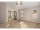 Bright, carpeted main bedroom with mirrored closet doors at 15431 S 36Th Pl, Phoenix, AZ 85044