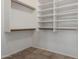 Walk-in closet with shelving and ample storage space at 15431 S 36Th Pl, Phoenix, AZ 85044