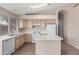 Kitchen with a center island, ample countertop space, and white appliances at 15431 S 36Th Pl, Phoenix, AZ 85044