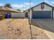 Charming single-story home featuring a gravel front yard and a two-car garage at 1805 E Bluefield Ave, Phoenix, AZ 85022