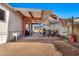 Back patio with an outdoor dining area and mountain views at 1936 S Mariposa Rd, Apache Junction, AZ 85119