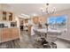 Kitchen with a breakfast nook, view, and wood-look flooring at 1936 S Mariposa Rd, Apache Junction, AZ 85119