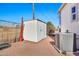 Backyard storage shed located next to the AC unit at 1936 S Mariposa Rd, Apache Junction, AZ 85119