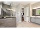 Luxurious bathroom featuring a glass-enclosed shower, double vanity, and tile flooring at 2081 E Aquarius Pl, Chandler, AZ 85249