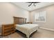 Bedroom featuring hardwood floors, a ceiling fan, and classic furnishings at 2081 E Aquarius Pl, Chandler, AZ 85249