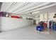 Spacious garage with epoxy floors and ample storage cabinets at 2081 E Aquarius Pl, Chandler, AZ 85249