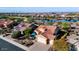 Overhead view of home displaying tile roof, desert landscaping, proximity to a lake and golf course at 21500 N 262Nd Ln, Buckeye, AZ 85396