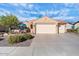 Charming single-Gathering home featuring a three-car garage and beautiful desert landscaping at 21500 N 262Nd Ln, Buckeye, AZ 85396