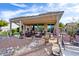 Relaxing covered patio area perfect for outdoor dining and entertaining with great backyard view at 21500 N 262Nd Ln, Buckeye, AZ 85396