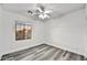 Bedroom with a neutral color palette and window overlooking the neighborhood at 22317 N 39Th Run, Phoenix, AZ 85050