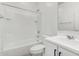 Bathroom with shower-tub combo, white vanity and tile flooring at 22679 E Estrella Rd, Queen Creek, AZ 85142