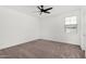 Bright bedroom with carpet and ceiling fan at 22679 E Estrella Rd, Queen Creek, AZ 85142