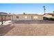 Fully fenced backyard features gravel, pavers and a detached gazebo at 2305 S Orange --, Mesa, AZ 85210