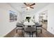 Contemporary dining room featuring modern furnishings, hard wood floors, and a large window at 2305 S Orange --, Mesa, AZ 85210