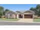 Beautiful single-story home with stone accents, desert landscaping, and a two-car garage at 25135 N 177Th Dr, Surprise, AZ 85387