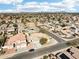 Community aerial view, single-story home featuring desert landscaping, tile roof, and two-car garage at 2520 W Minton St, Phoenix, AZ 85041