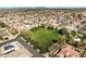 Neighborhood green space with mature trees and manicured lawn, offering a serene and community-focused setting at 2520 W Minton St, Phoenix, AZ 85041