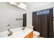 Bathroom with double sink vanity, large mirror, and shower with dark accents at 2520 W Minton St, Phoenix, AZ 85041