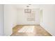 Dining room features neutral walls, tile flooring, and a modern light fixture at 2520 W Minton St, Phoenix, AZ 85041