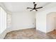 Bright living room featuring tile flooring, a window, and natural light at 2520 W Minton St, Phoenix, AZ 85041