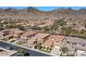 Scenic view of a residential neighborhood nestled in the foothills of desert mountains at 2738 W Silver Fox Way, Phoenix, AZ 85045