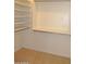 Walk-in closet featuring shelving and a hanging rod for optimized organization at 3145 W Sandra Ter, Phoenix, AZ 85053