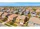 Aerial view of neighborhood homes, some with solar panels on their roofs at 3548 E Mesquite St, Gilbert, AZ 85296