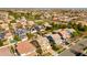 An aerial view of a residential neighborhood with many two-story homes and green spaces at 3548 E Mesquite St, Gilbert, AZ 85296