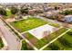 Aerial view of a park featuring a playground and basketball court, nestled in a residential area at 3548 E Mesquite St, Gilbert, AZ 85296