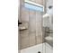 Shower with tile surround and sleek showerhead at 377 E Windsor Ave # 2, Phoenix, AZ 85004