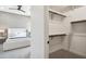 Spacious walk-in closet featuring ample shelving and hanging space adjacent to the main bedroom at 377 E Windsor Ave # 2, Phoenix, AZ 85004