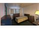 Basic bedroom with cabinets, bed and white walls at 3932 W Bethany Home Rd, Phoenix, AZ 85019