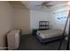 A bedroom with a ceiling fan and a bed with storage shelves at 3932 W Bethany Home Rd, Phoenix, AZ 85019