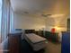 Neutral bedroom featuring blinds and basic furnishings at 3932 W Bethany Home Rd, Phoenix, AZ 85019