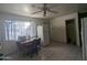 Bright kitchen area with a dining table, tile floors, and a large window at 3932 W Bethany Home Rd, Phoenix, AZ 85019