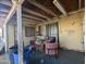 Covered patio area with a table and chairs, perfect for outdoor dining and entertaining at 3932 W Bethany Home Rd, Phoenix, AZ 85019