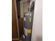 An enclosed view of a hot water heater in need of repairs at 3932 W Bethany Home Rd, Phoenix, AZ 85019