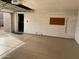 Clean garage with epoxy flooring and open door at 4107 E Charter Oak N Rd, Phoenix, AZ 85032