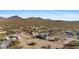 Aerial view of a desert community, showcasing the landscape and the spaciousness between homes at 43611 N 1St Dr, New River, AZ 85087