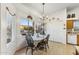 Cozy dining area with natural light and adjacent to the kitchen at 43611 N 1St Dr, New River, AZ 85087