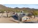 View of a single-story desert home with drought resistant landscaping against a mountain backdrop at 43611 N 1St Dr, New River, AZ 85087