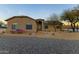 Charming single-story home with desert landscaping, gravel and easy-care plantings at 43611 N 1St Dr, New River, AZ 85087