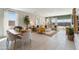 Inviting living room area with a dining table and lots of natural light at 469 W Freedom St, Florence, AZ 85132