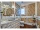 Stylish bathroom with decorative wallpaper, marble counters, and luxury fixtures at 5819 E Calle Del Media --, Phoenix, AZ 85018