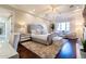 Bright and inviting main bedroom featuring a chandelier, sitting area, and comfortable furnishings, creating a tranquil retreat at 5819 E Calle Del Media --, Phoenix, AZ 85018