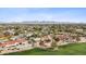 Expansive aerial view of the property showcasing its prime location with views of the surrounding community and distant mountains at 5827 E Sanna St, Paradise Valley, AZ 85253