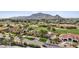 Expansive property overlooking a lush golf course with palm trees and scenic mountain views at 5827 E Sanna St, Paradise Valley, AZ 85253